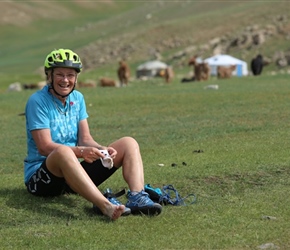 Muriel changing shoes for river crossing