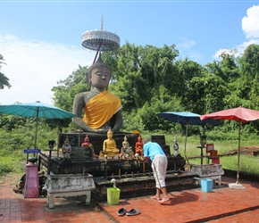 Praying at ruined temple in old Chiang Mai