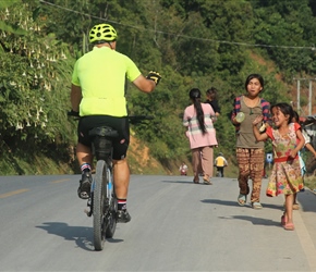 Michael greets the local children