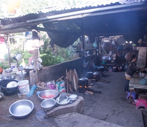 Clearing up after breakfast in the back kitchen