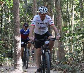 John through woods in Angkor Wat complex