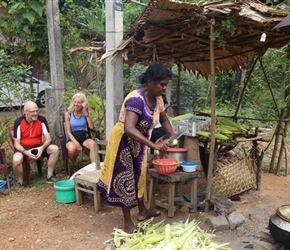 Waiting for our dinner of sweetcorn from a roadside seller at Habarana