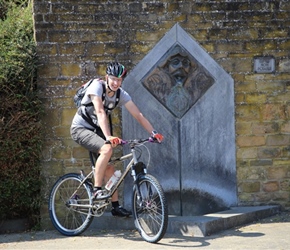 John Wilson  next to the fountain at Hamois