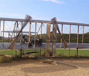 Detailed statue of the Wrights take off for the first flight