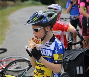 Jeferson munching a pain au raisin