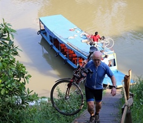 Phil unloading bike at Battanbangjpg