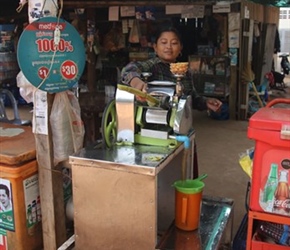 Sugar Cane drink production. Don't put your fingers in the grinder.