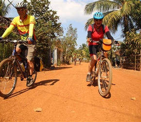 Jack and Christine on red road to Sihanoukville