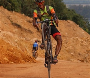 Pulling a wheelie on the red road to Sihanoukville