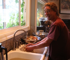 Matt crab washing at Salmonberry Inn