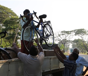 Unloading the bikes at Tambuttegama