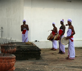 Musicians playing in the sunset at Minhitale Stupa