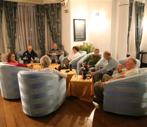 A the end of the day, we assembled for a beer in the bar