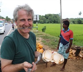 Neil scooping out the centre of the coconut 