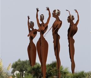 Statues on a roundabout near Petra