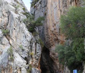 Linda through the pinch point near the start of Sa Colobra