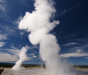 Clepsydra Geyser is a geyser in the Lower Geyser Basin of Yellowstone National Park in the United States. Clepsydra plays nearly continuously to heights of 45 feet. It was named by T. B. Comstock during the 1878 Captain Jones expedition, with its nom