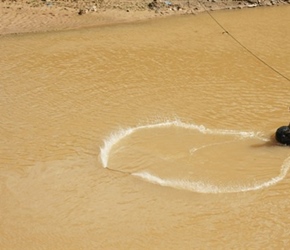 1.4 24 Netting fish on the river