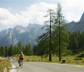 Malc climbs the Vrisic pass. The Vršič Pass, with an elevation of 1,611 metres, is a high mountain pass across the Julian Alps in northwestern Slovenia. It is the highest pass in Slovenia, as well as the highest in the Eastern Julian Alps