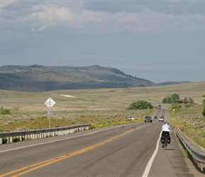 Phil on the road passing Mesa Resevoir