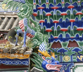 Dragon decoration on the corner of the roof at Jade Temple