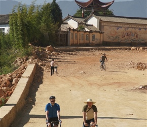 Ian and Graham along the dusty new road having just left the hotel