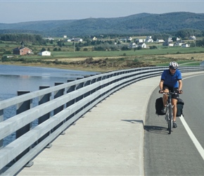 Paul crosses the bridge at Margaree