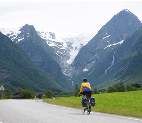 John cycling towards Briksdal