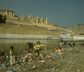 Idols lining the lake at Amer Fort