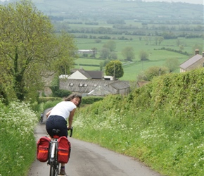 Jo descends towards Glastonbury Tor from Wells