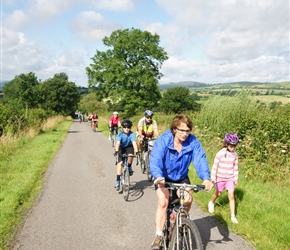 Adele, Lucy and the Hersey family climb the hill towards Medlicott