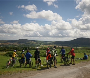 Clare, Helen, Adele, Elaine, Janice, Reuban, Graham, Hannah, Dave and Mica at the viewpoint having descended the Long Mynd