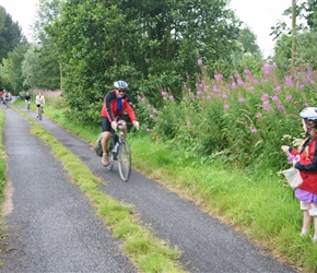 Dave along the lane to Hardwick, greeted by a flower picking Louise