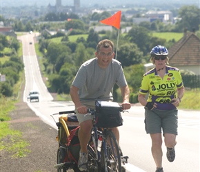 Siobhan finds it easier letting James pull the Burley trailer with Gabriela on board up the hill and away from Coutances