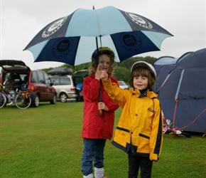 Catherine and Francis waiting for the rain to pass