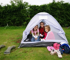 Lucy, Louise and Ariane in the girlie tent making Origami Lillies