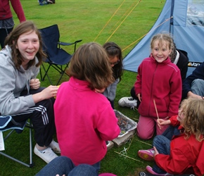 Toasting marshmallows at the last night BBQ