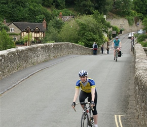 Sarah crosses the bridge at Ludlow