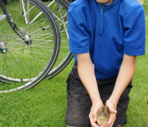 Christopher with a small carp at the campsite