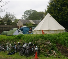 Giles cooks an evening meal next to his amazing wigwam tent