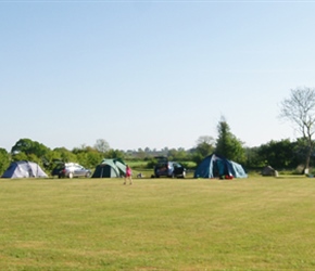 Early morning at the campsite. Giles's teepee is particularly striking