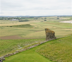 Rolling down the bank at Dunstanburgh Castle