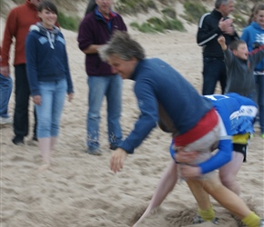 Well the Scots would do anything. Here Jonathan resorts to rugby to prevent Neil scoring  home run