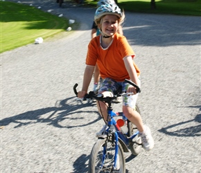 Louise tries out a solo bike at the chateau