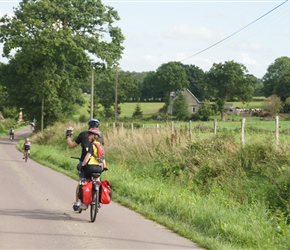 Steve waves as he and Emma carry on down the road