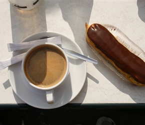 Chocolate eclair and coffee