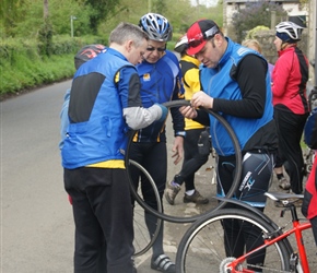 One of the many lovely things about these holidays was that if something went wrong, others pitched in. In this case Nigel, Steve and Kevin look to repair a puncture