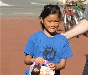 Ruby with her boulangerie purchase in Gemozac