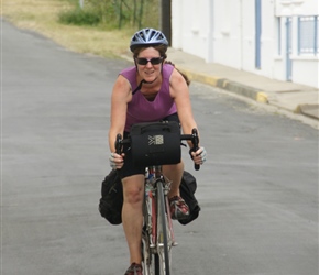 Sarah at the bottom of the hill having descended into Mortagne