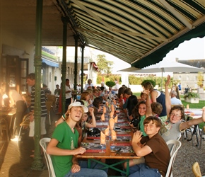 We booked a restaurant in the centre of Pons opposite Le Donjon. Here the young persons end of the table featuring Gordon and Robert